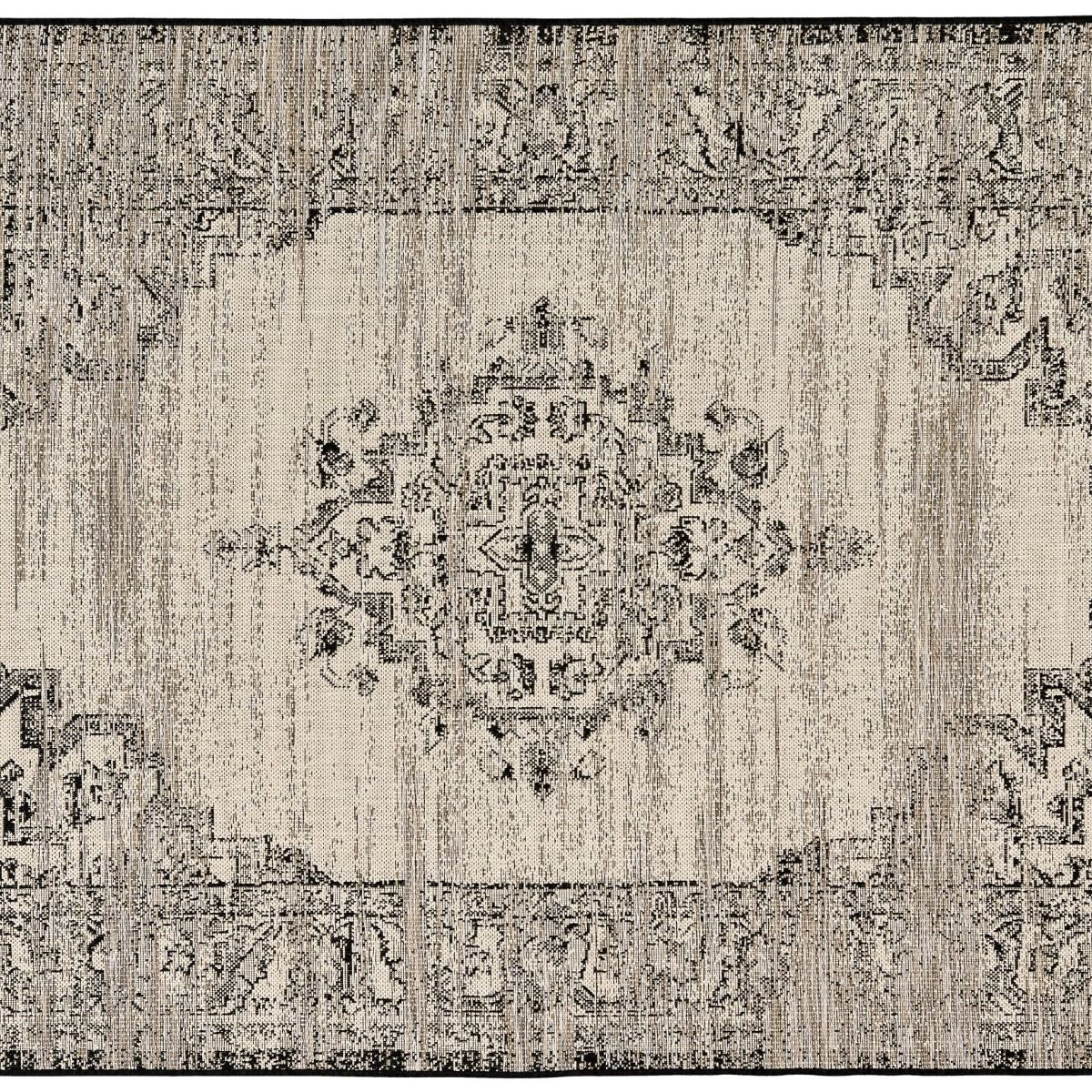 Decorative area rug with intricate patterns in neutral colors