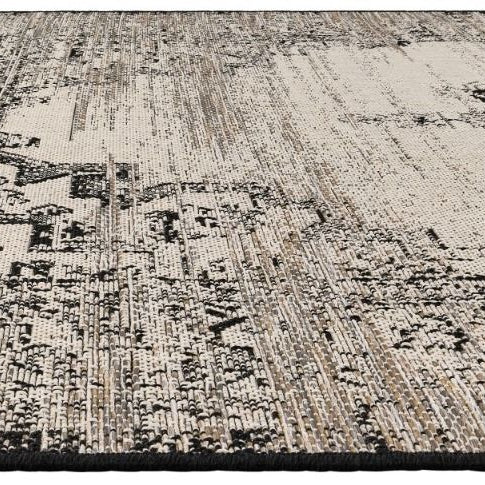 Rug with a geometric pattern on a plain background