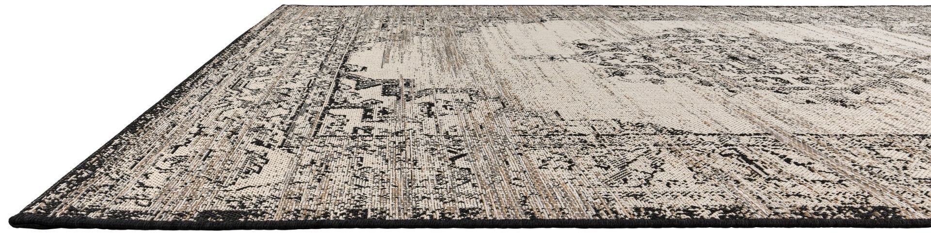 Rug with a geometric pattern on a plain background