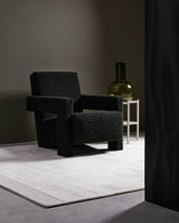 Image of the rug in a styled room setting, demonstrating its versatility and ability to complement modern decor.