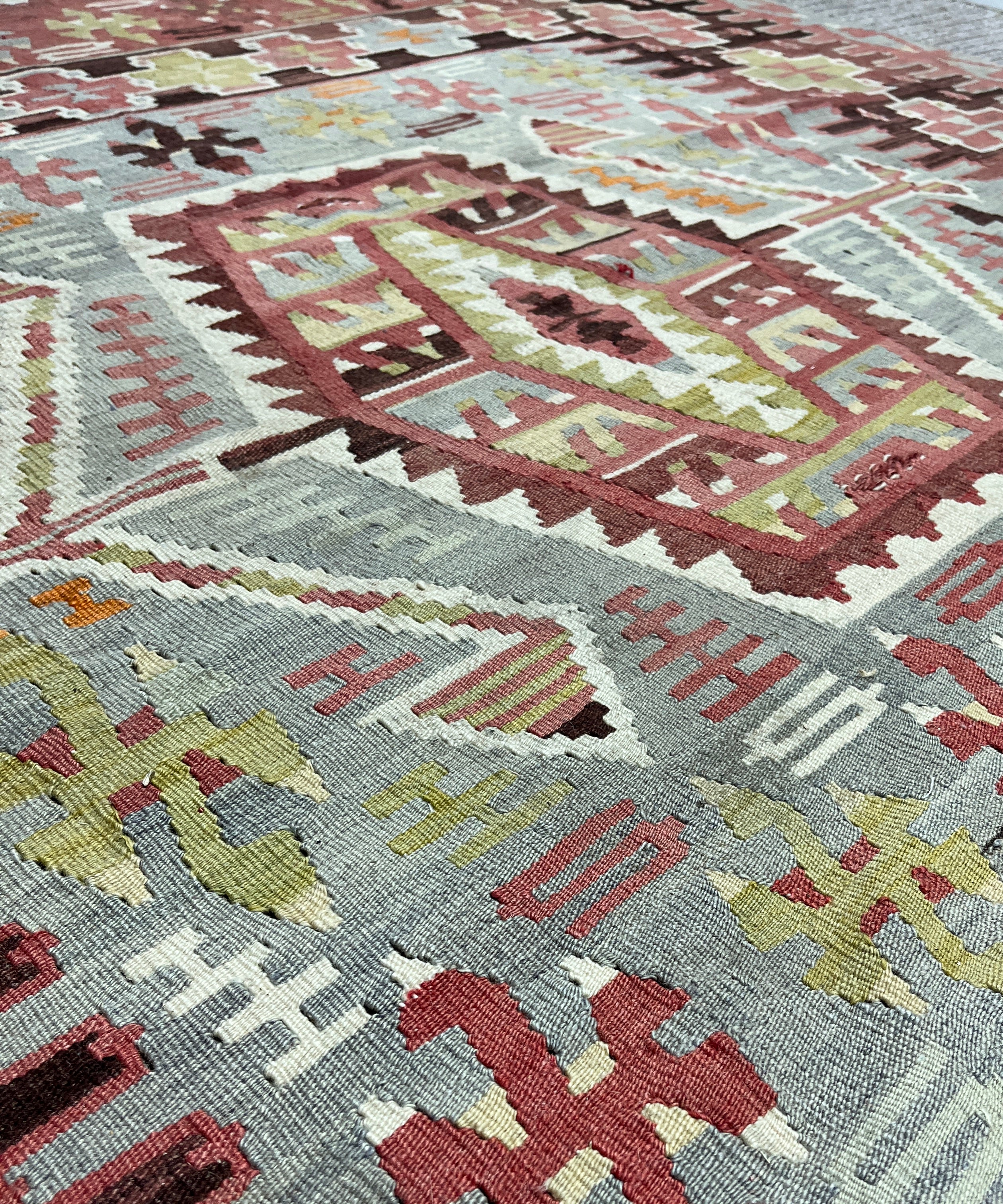 Close-up of a patterned rug with geometric design