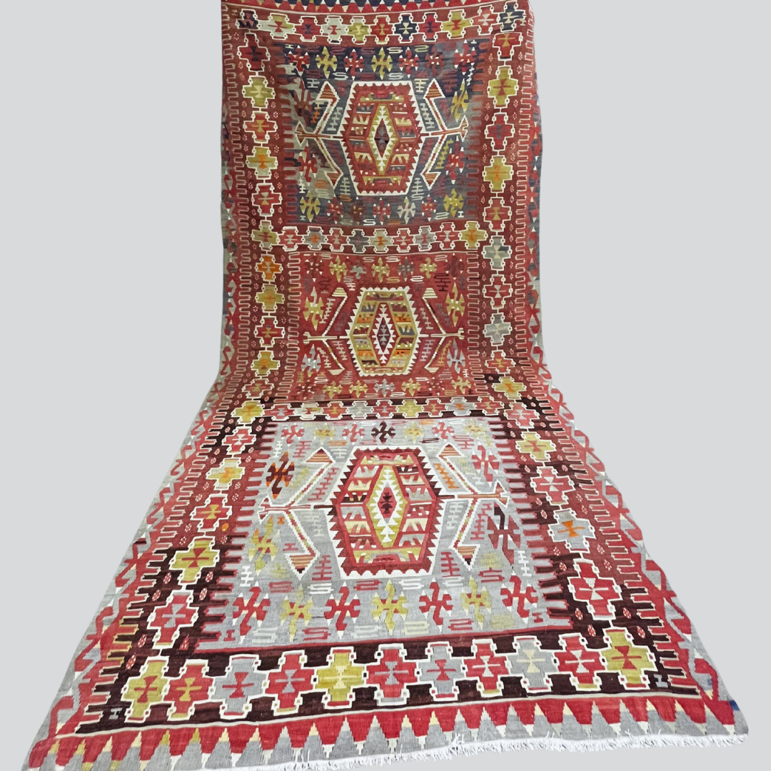 Decorative rug with geometric pattern on a plain background