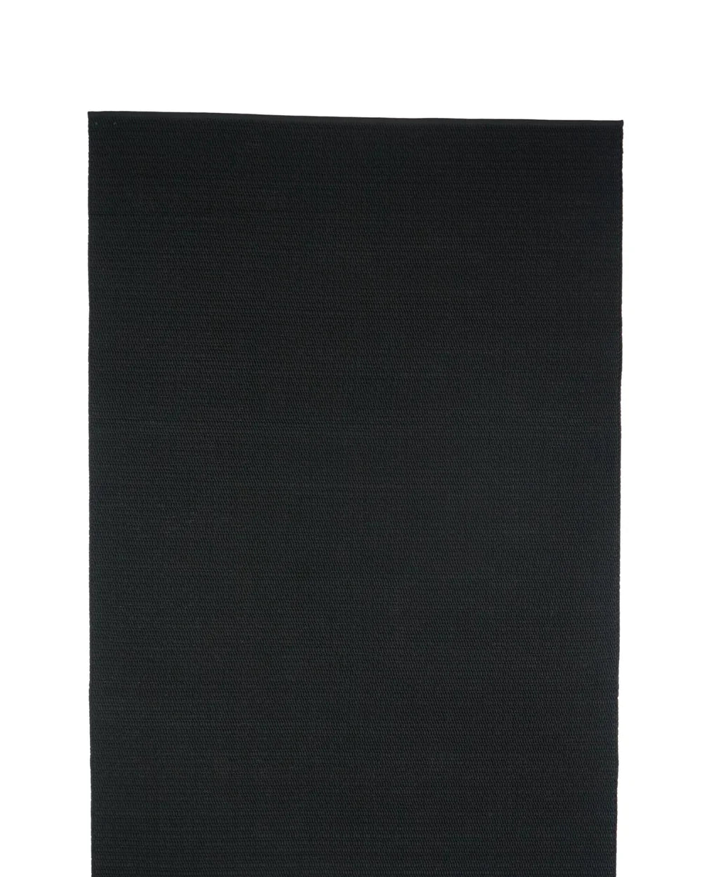 Black rectangular rug on a white background