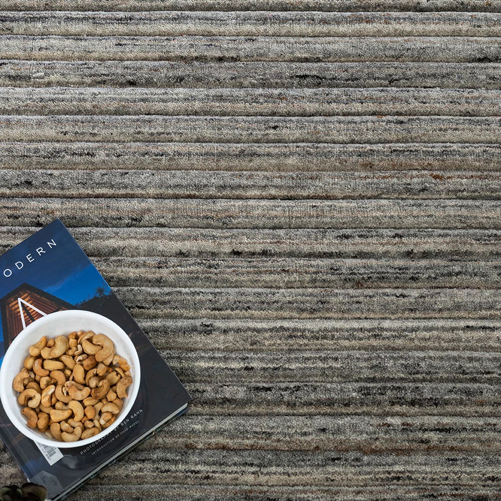 An image depicting the rug within a chic interior, illustrating how its earthy tones and contemporary design effortlessly complement Australian home decor.