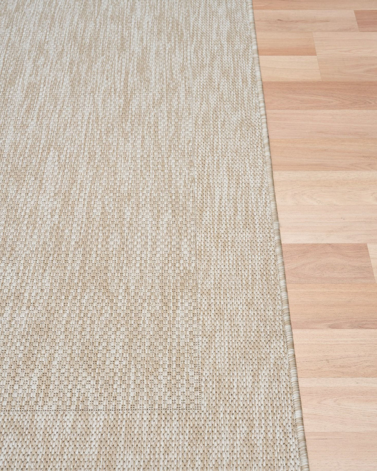 Chino Sand Rug on timber flooring