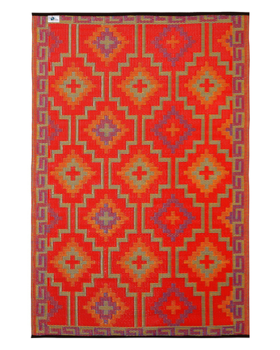 A rectangular woven rug with a bold geometric pattern in red, orange, purple, and beige, shown flat against a white background.
