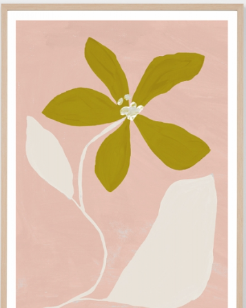 A framed botanical art print featuring a stylized olive green flower with five petals and white accents on a dusty pink background, enclosed in a light wood frame.