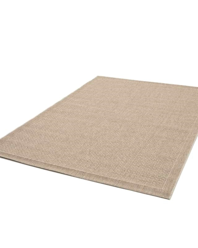 Beige rug on a white background