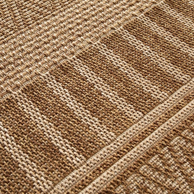 Close-up of a brown and beige woven fabric texture