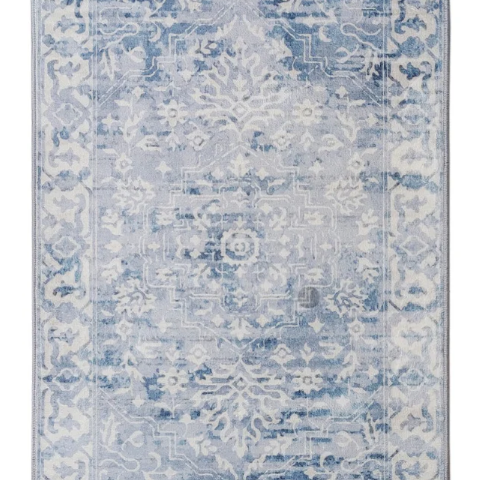 Decorative rug with blue and white pattern on a plain background