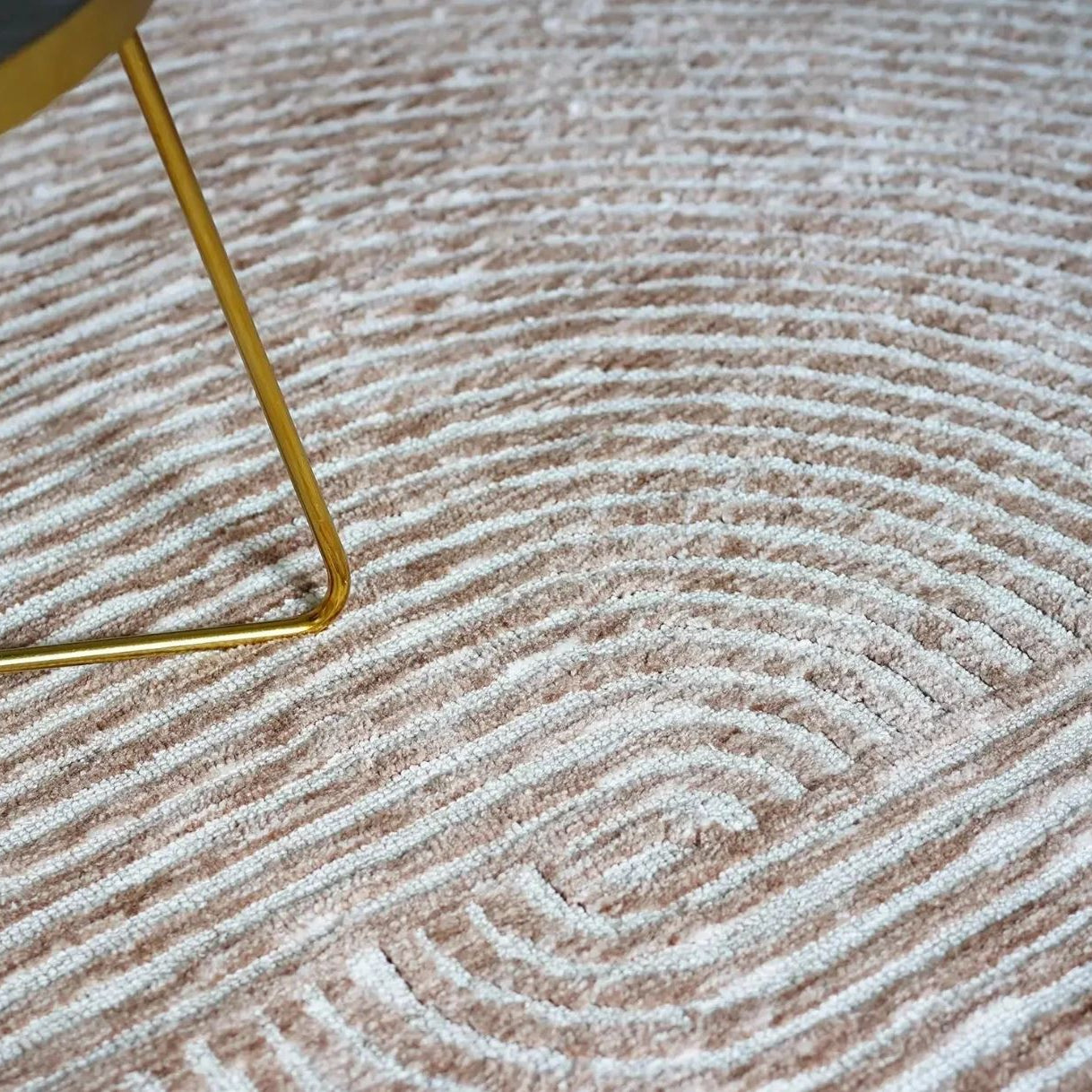 close up of vista rug with gold furniture leg