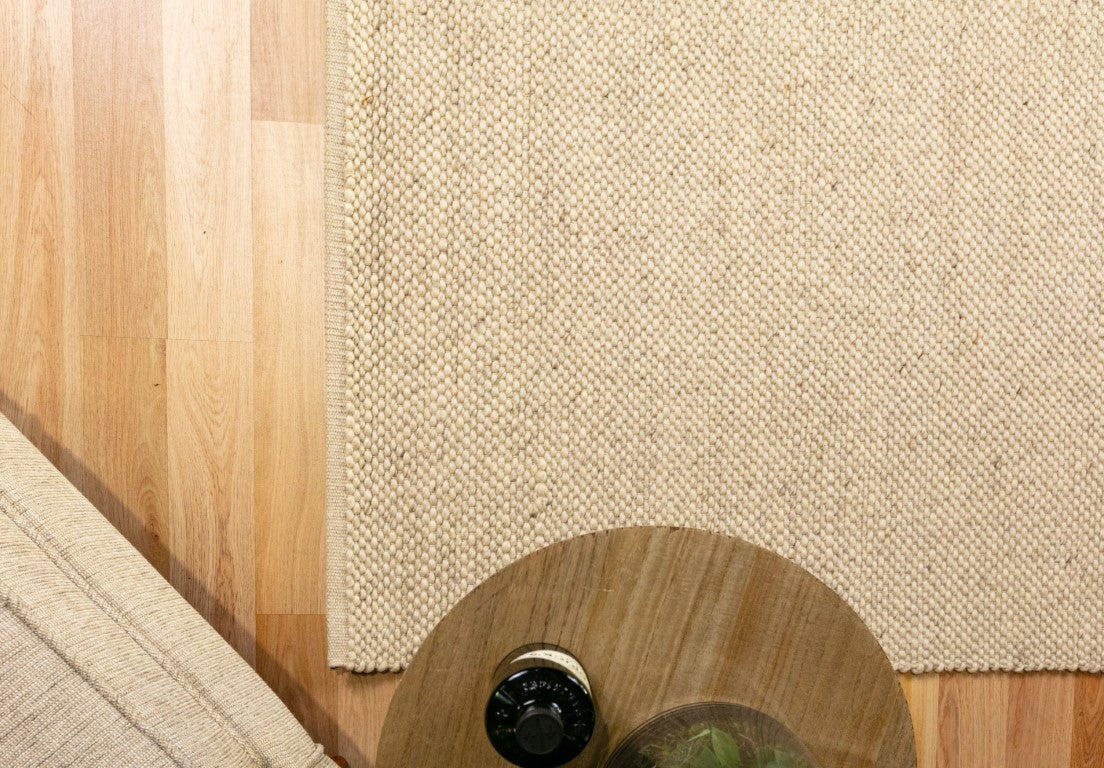 Close-up of the Park Lane Pearl Rug's intricate weave, showcasing the high-quality blend of New Zealand wool and polyester for lasting beauty and comfort.