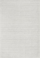 Entire view of the Allure Rug in a serene Sky colour, showcasing its hand-loomed elegance and soft, tranquil hues ideal for creating a peaceful home setting.