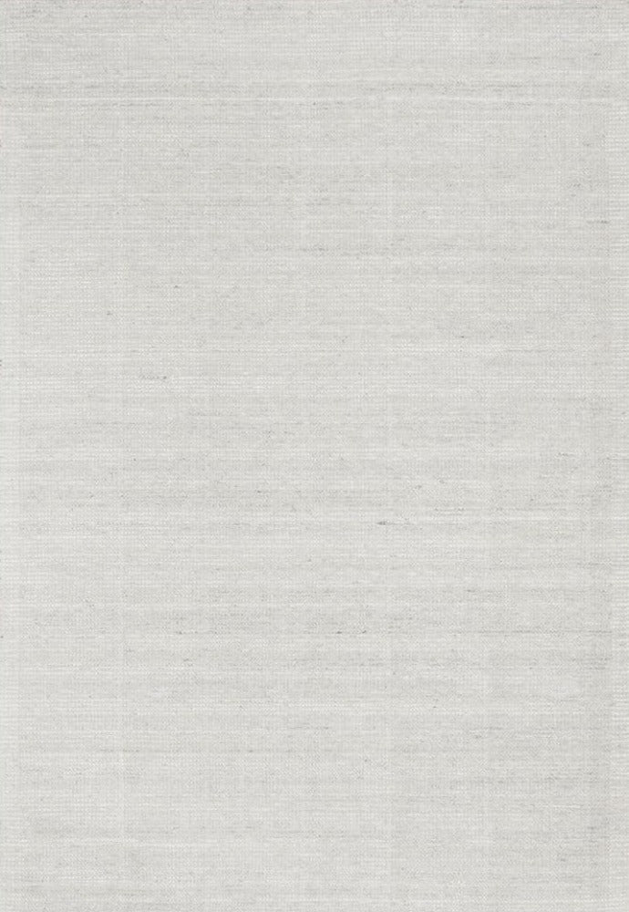 Entire view of the Allure Rug in a serene Sky colour, showcasing its hand-loomed elegance and soft, tranquil hues ideal for creating a peaceful home setting.