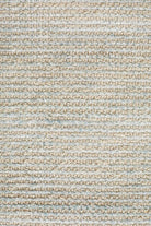Detailed close-up of the Allure Rug in Sky, highlighting the intricate texture from its rayon-cotton blend and the luxurious 9mm cut loop pile.