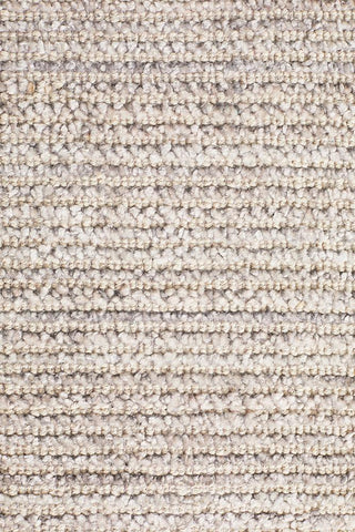 Focused image showing the precision of the Allure Rug's edge in Stone colour, highlighting the craftsmanship of its hand-loomed construction.