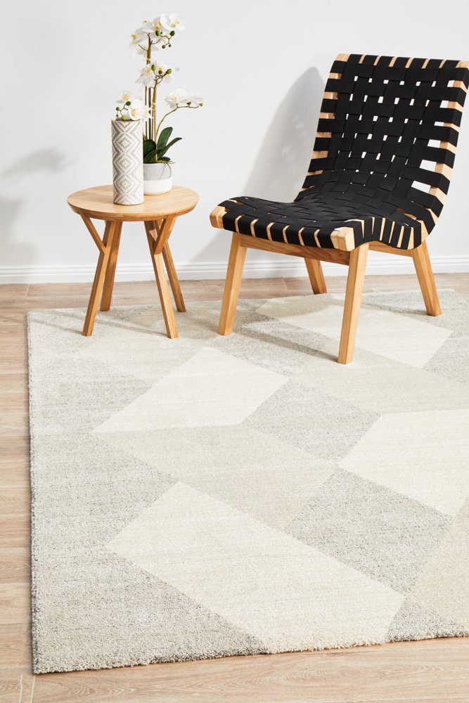 The Alpine Collection Rug in a living room setting, showing how its contemporary design and neutral colors enhance modern decor.