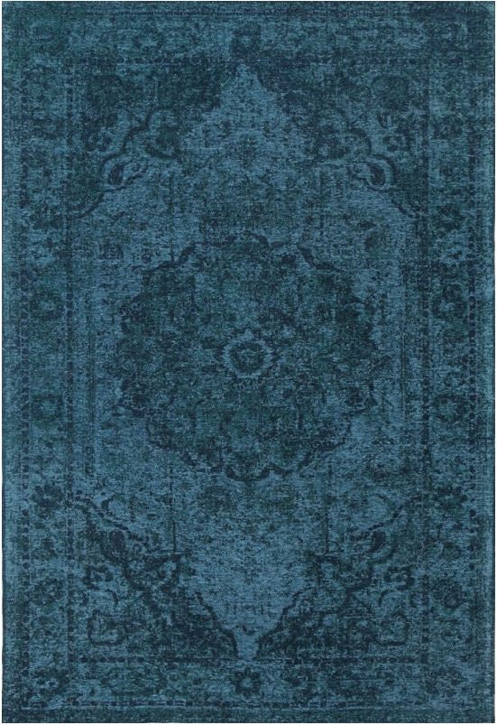 Blue patterned rug with intricate design