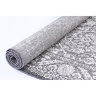 Angelika Rug Beige rolled up
