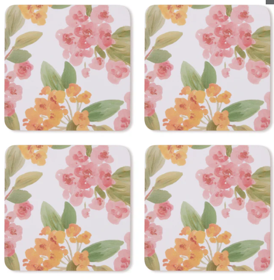 Set of four floral coasters with pink and orange flowers on a white background