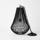 A black metal hanging pendant light with a textured beaded cone shade, hanging chain, and socket with cord, photographed on a clean white studio background.