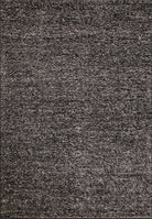Textured dark gray rug with a subtle pattern