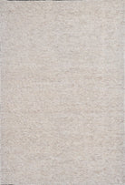 Textured beige rug with a subtle pattern