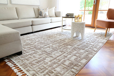 Bilbao rug displayed in a Noosa coastal-themed room, highlighting its compatibility with beach-style decor.