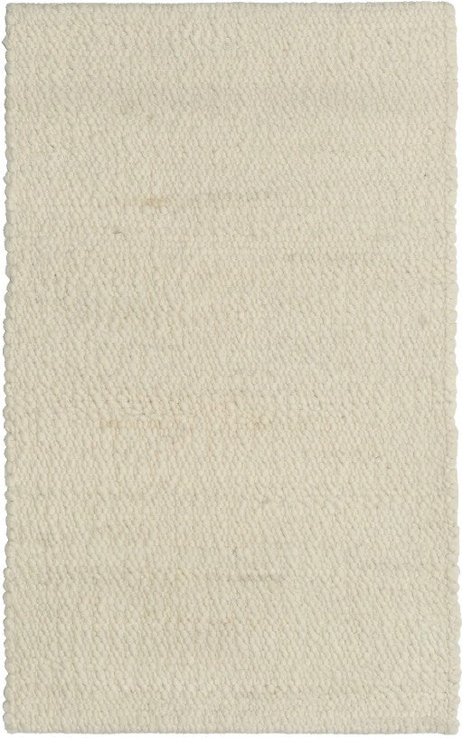 A textured looped and sheared ivory-colored handwoven wool rug