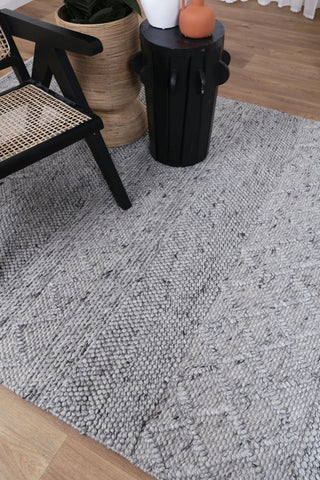 Close-up of the Bella Rug's intricate texture, highlighting the skilled artistry and soft, luxurious finish of the wool-viscose blend.