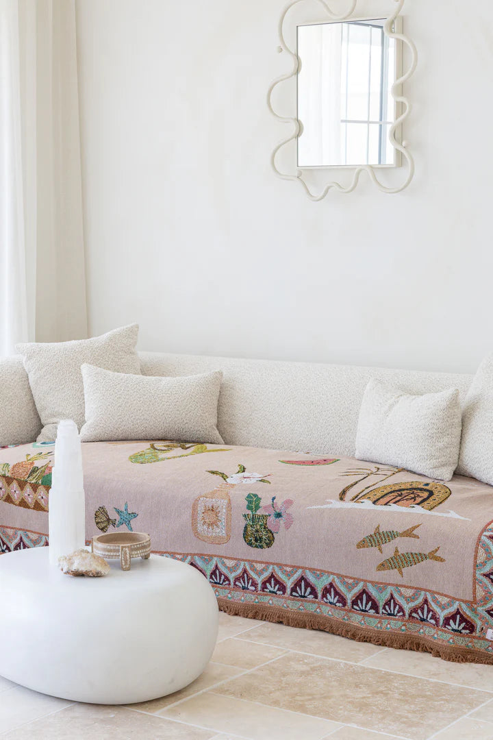 Decorative sofa with a floral pattern in a bright living room.