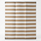 A rectangular striped mat or rug with alternating horizontal tan and white stripes, finished with a thin black border, shown flat against a light gray background.
