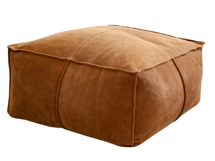 Brown leather ottoman on a white background