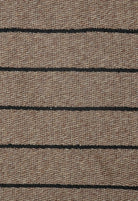 Close-up of brown fabric with black horizontal lines