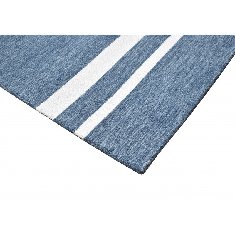 Blue and white striped rug on a white background