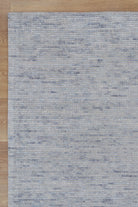 Casper Light Blue Rug on timber flooring