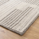 Textured area rug on a wooden floor