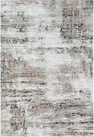 Textured area rug with abstract pattern on a white background