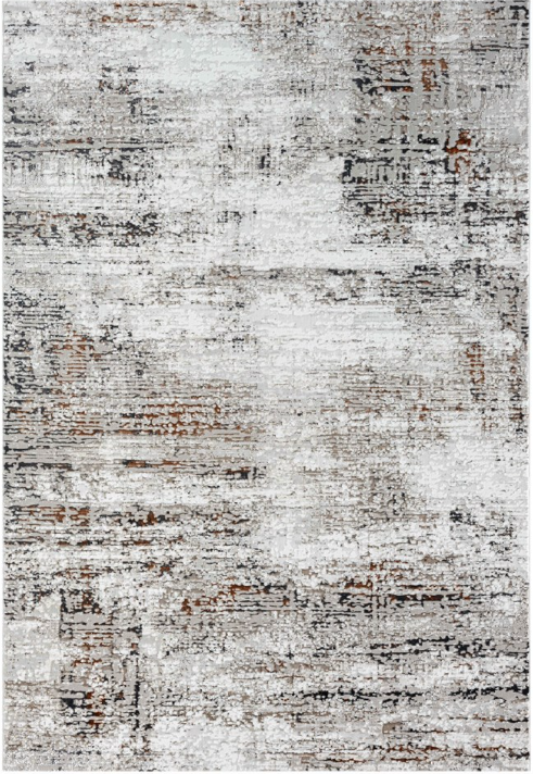Textured area rug with abstract pattern on a white background