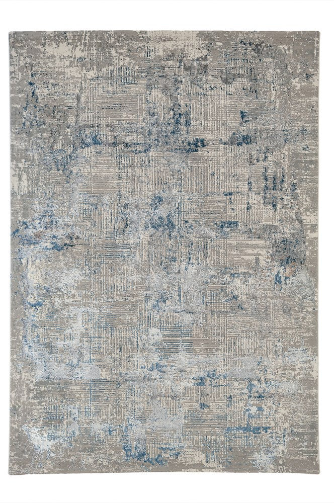 Textured area rug with blue and gray pattern on a white background