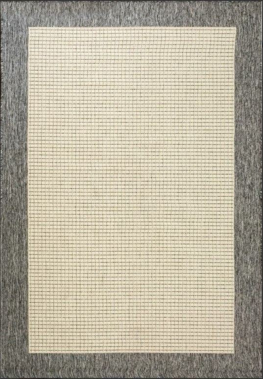 Sheet of graph paper with a grid pattern on a textured gray background
