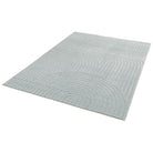 Light gray textured rug on a white background