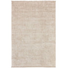 A rectangular area rug with a distressed, textured pattern in warm beige and cream tones, shown flat against a white background.