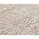 Close-up of textured beige fabric with wavy pattern