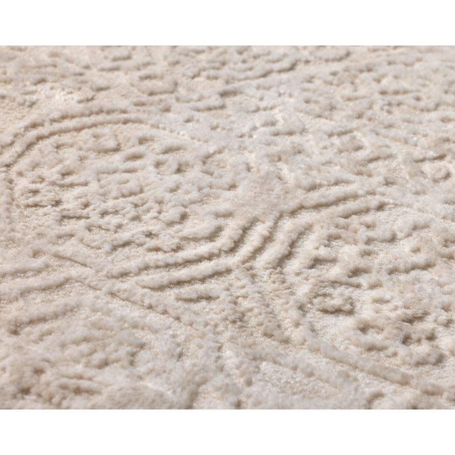Close-up of textured beige fabric with wavy pattern