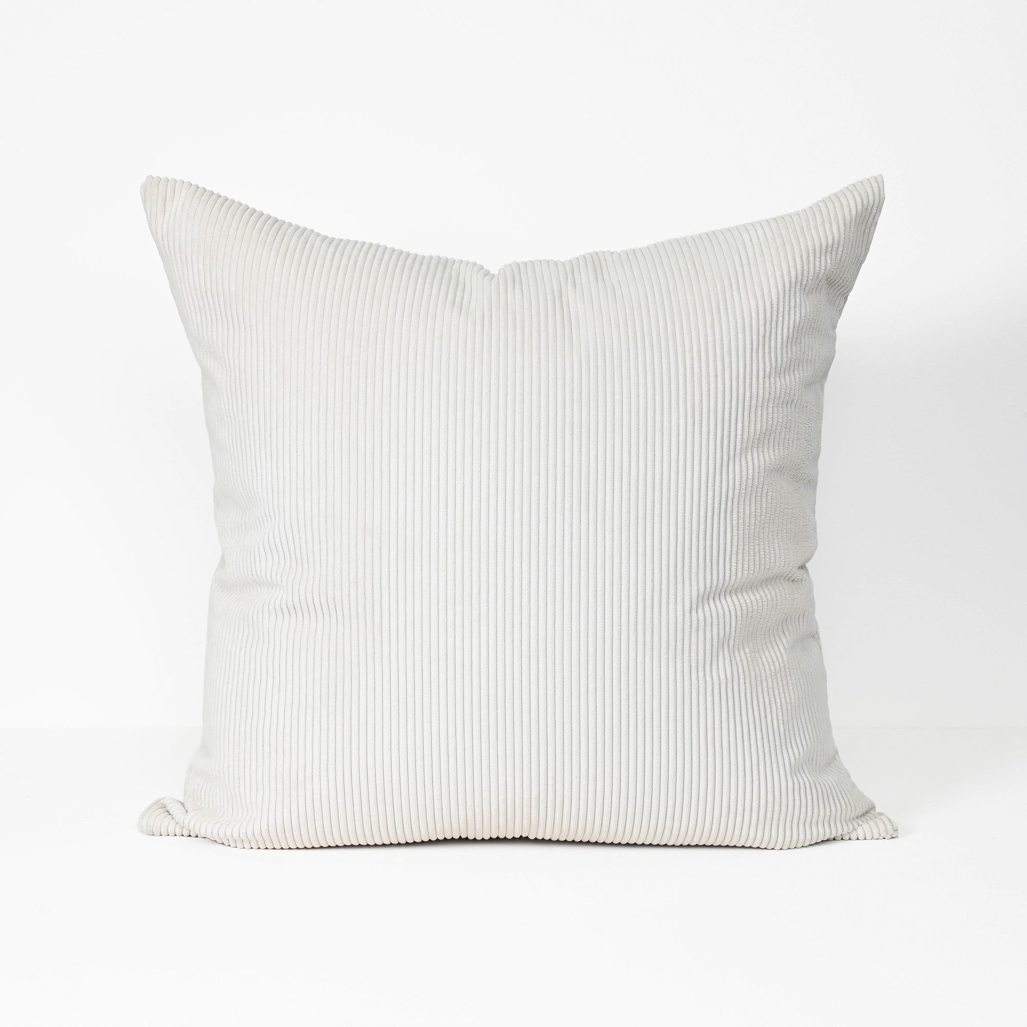 A square throw pillow in a light gray ribbed corduroy fabric, shown against a plain white background.