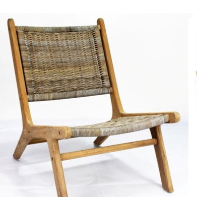 Wooden chair with wicker backrest on a white background