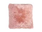 Pink fluffysheepskin pillow on a white background
