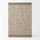 A rectangular area rug with a textured vertical ribbed pattern in beige and brown tones, featuring solid brown borders on the top and bottom, shown against a plain white background.