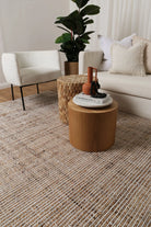 Dune Ivory Rug displayed in a room with neutral decor, accentuating its versatility and natural aesthetic.